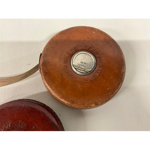 56 - 2 VINTAGE LEATHER CASED TAPE MEASURES - CHESTERMAN AND LUFKIN USA