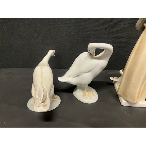 57 - JUTER LADY FIGURE,SAX LADY FIGURE AND 2 LLADRO SWANS