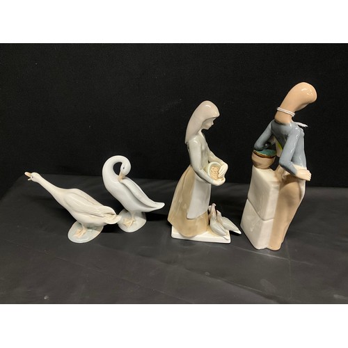 57 - JUTER LADY FIGURE,SAX LADY FIGURE AND 2 LLADRO SWANS