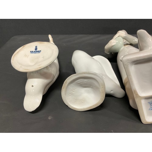 57 - JUTER LADY FIGURE,SAX LADY FIGURE AND 2 LLADRO SWANS