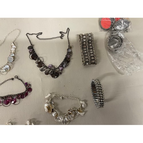93 - BOX OF COSTUME JEWELLERY AND PHOTO FRAME