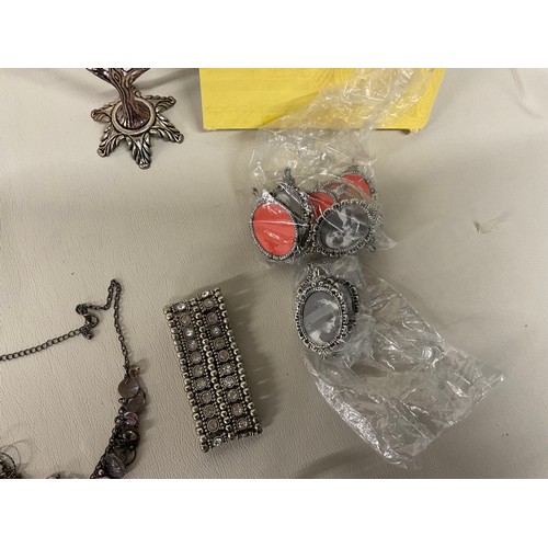 93 - BOX OF COSTUME JEWELLERY AND PHOTO FRAME