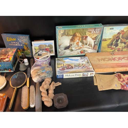 TWO BOXES OF ODDS TO INCLUDE TABLE LAMPS, DRESSING TABLE SET, JIGSAWS ETC