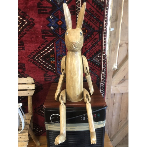 Wooden store jointed rabbit