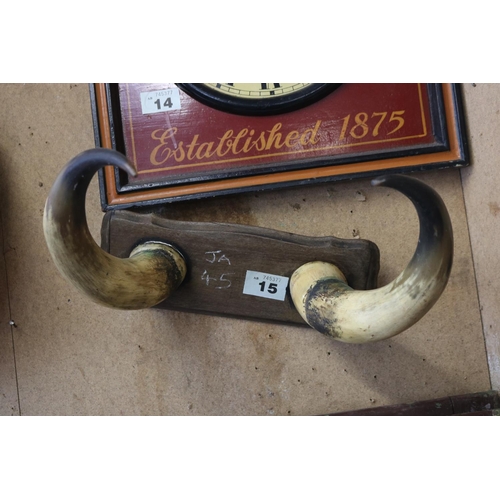 15 - Cow horns on plaque pair of antique window shutters