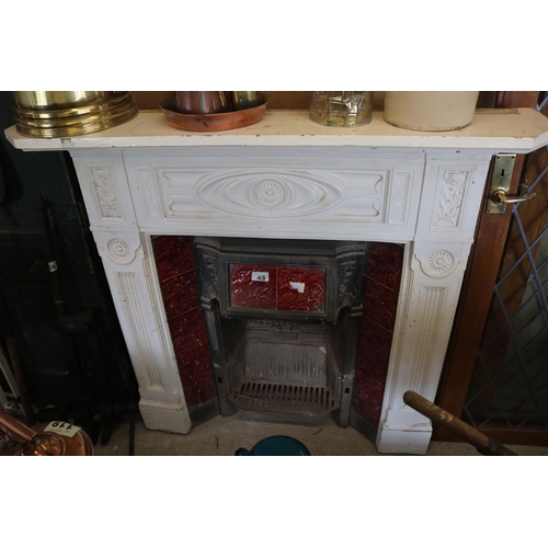 43 - Cast iron tiled fireplace