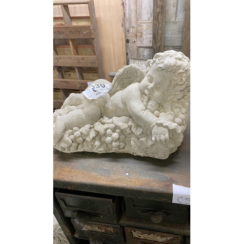 636 - Stoneware sleeping cherub