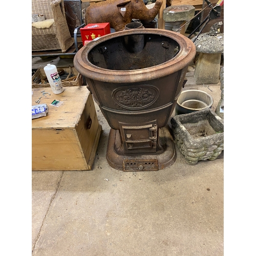 925 - ornate Iron boiler housing