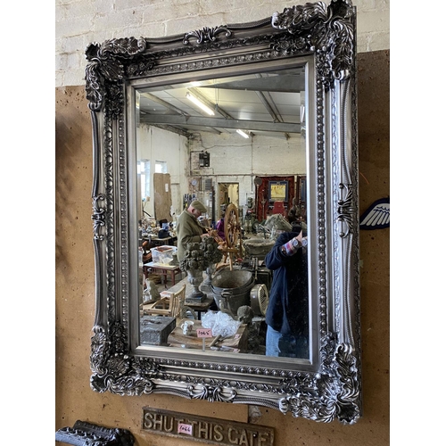 1065 - Silvered framed ornate mirror 46