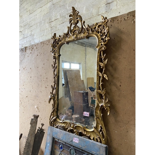 1072 - Ornate gilt wall mirror 42