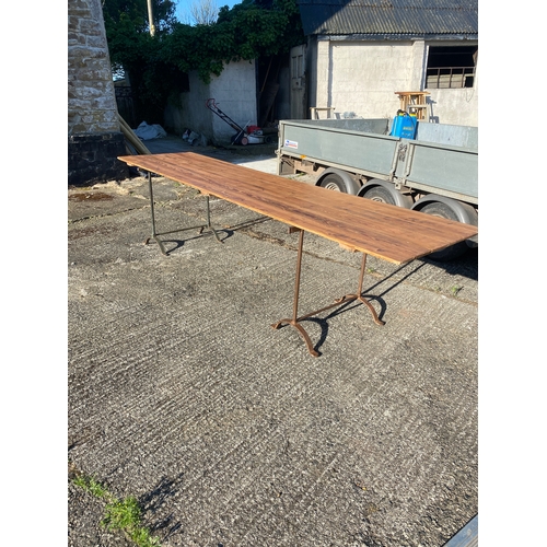 777 - 12ft pine hall table on iron trsetles