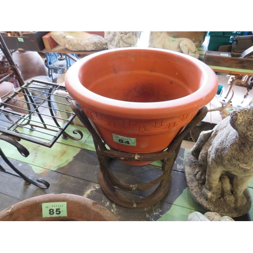 84 - Terracotta pot in metal stand