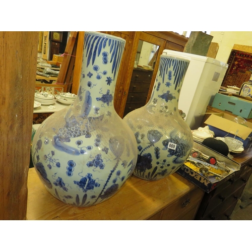 669 - Pair blue & white oriental spill vases height 24