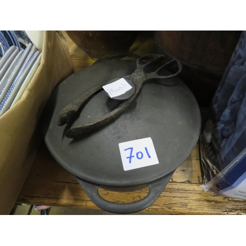 701 - Cast iron saucepan with tongs