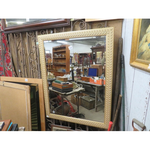 725 - Gilt bevelled edged wall mirror 44