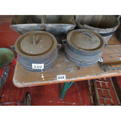 340 - Pair circular iron crocks with lids diameter 8