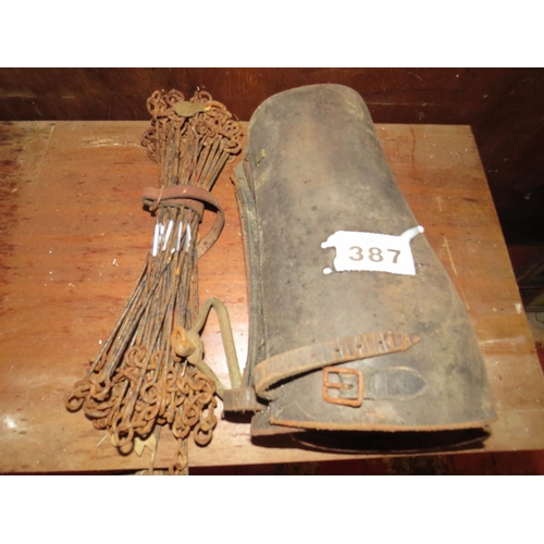 387 - Pair leather gaiters & measure for cricket field