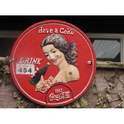 454 - Cast iron circular Coca Cola sign