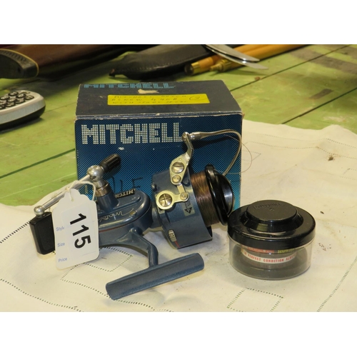 115 - Mitchell match & spare spool in box (as new)