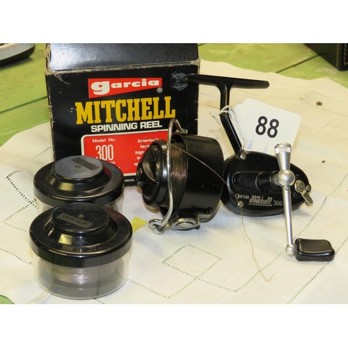 88 - Mitchell 300 & 2 spare spools in box