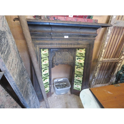 17 - Victorian cast iron fireplace with tiles