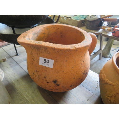 84 - Terracotta jug 12