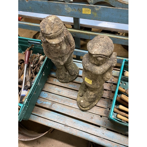 590 - 2 reconstituted stone golfing figures