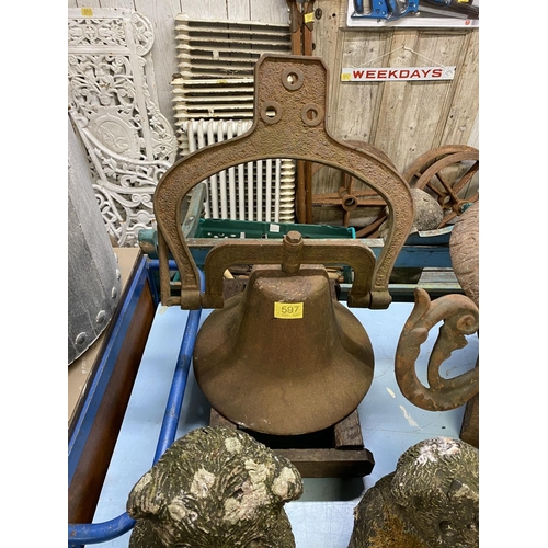 597 - Large antique iron bell on hanger & wood stand