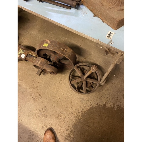 599 - Iron pulley wheel & 2 other wheels