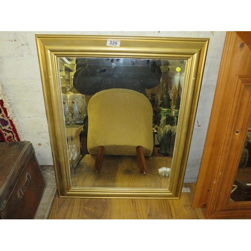 329 - Gilt frame bevelled edge mirror 25