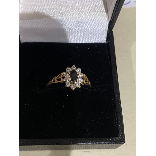 109C - 9ct gold saphire & diamond ring