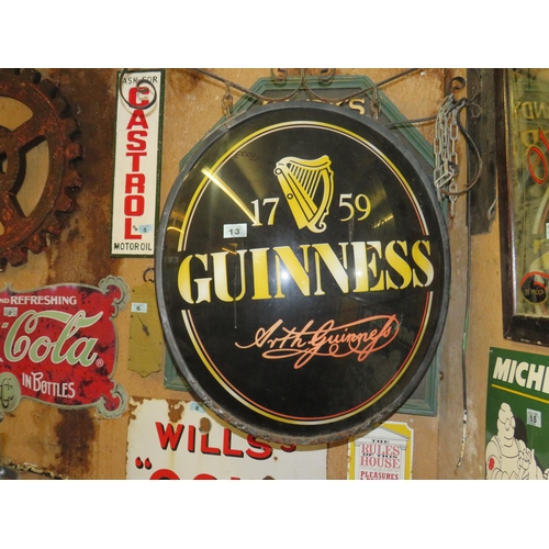 13 - Circular hanging Guinness sign,double sided 32