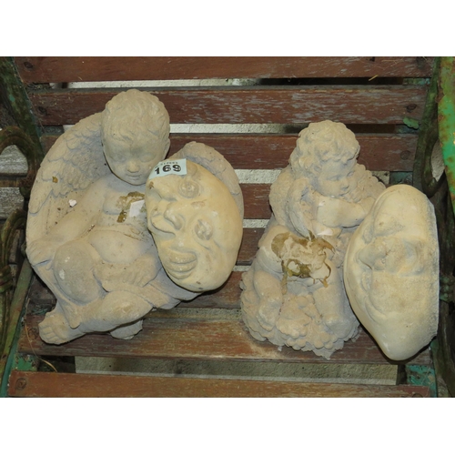 169 - 2 moons & 2 reconstituted stone cherubs