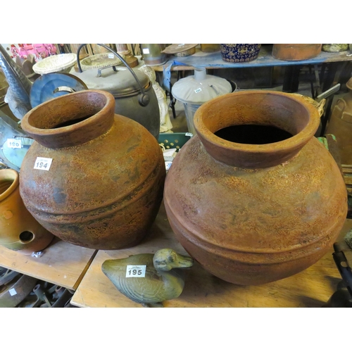 194 - Pair terracotta pots height 18