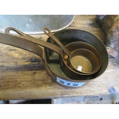 215 - 3 graduated small copper saucepans