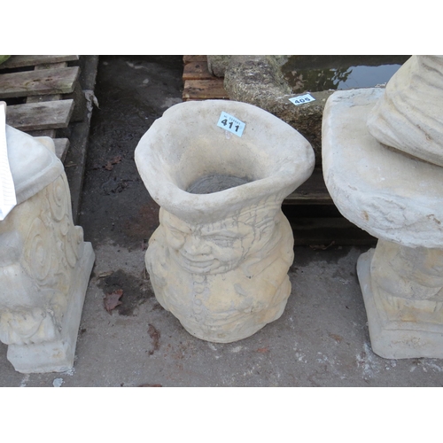 411 - Reconstituted stone Toby pot