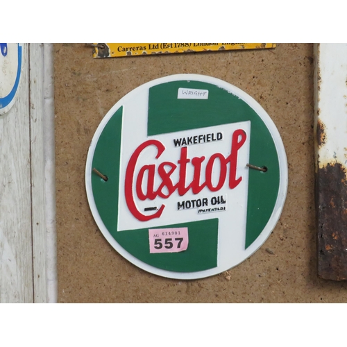 557 - Cast iron sign diameter 9.5