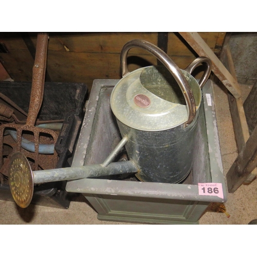 186 - Galvanised watering can & garden pot