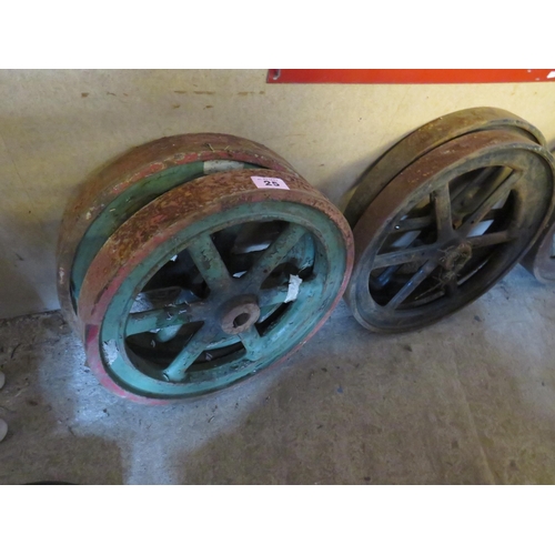 25 - 2 pairs cast iron wheels diameter 20