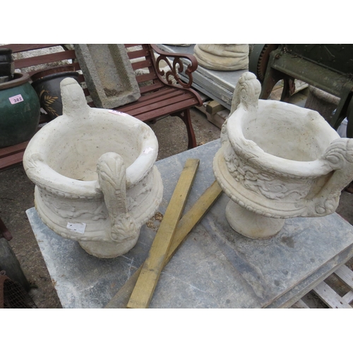 384 - Pair reconstituted stone planters on plinths