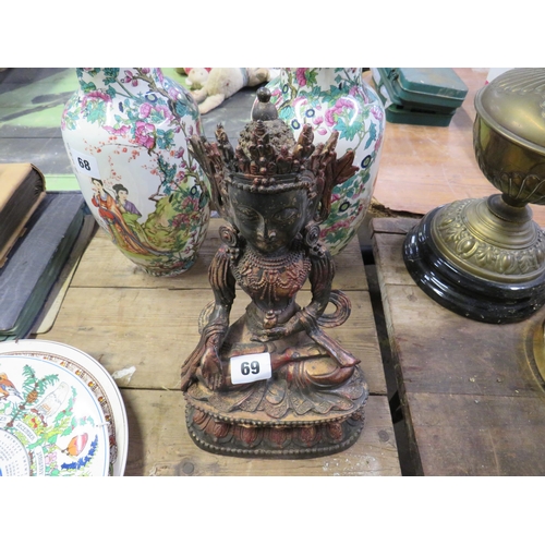 69 - Oriental bronze seated deity