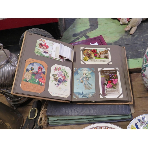 75 - 3 postcard albums with many postcards