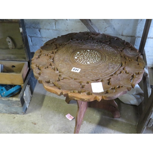 231 - Eastern carved teak coffee table