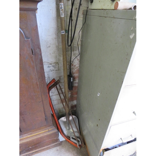 236 - 2 hand saws & spade