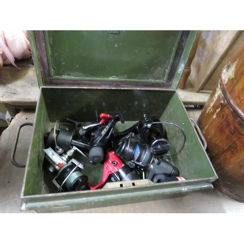 90 - Metal tin with fishing reels