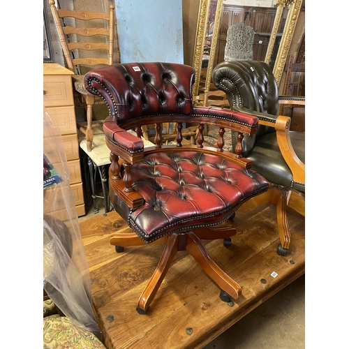 531 - Leather swivel office chair with button back