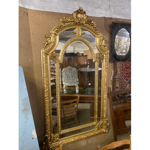 548 - Ornate bevelled edge wall mirror 6ft 6