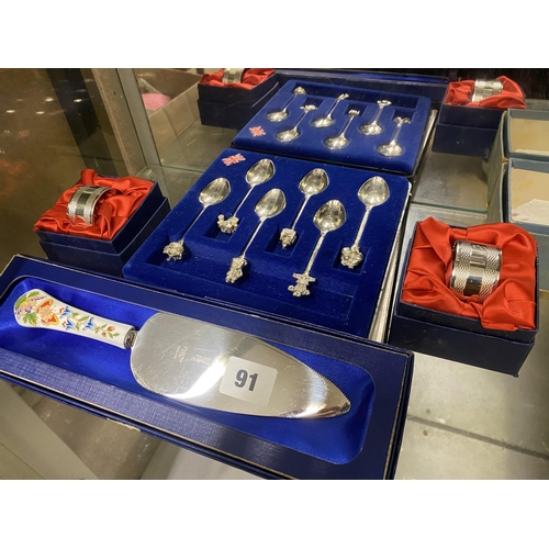 91 - Set of 6 Charles & Diana 1981 souvenier teaspoons, plated Aynsley cake slice and two napkin rings