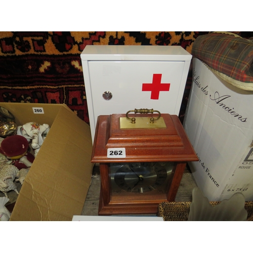 Clock &1st aid cabinet