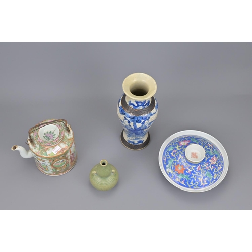 29 - A chinese porcelain teapot. together with blue and white vase, tureen and celadon bottle. vase heigh... 